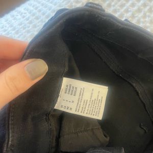 American Eagle Black Stretch Skinny Jeans w/ distressed bottoms